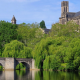 A Larger Clock Tower towering over the city of Limousin Region